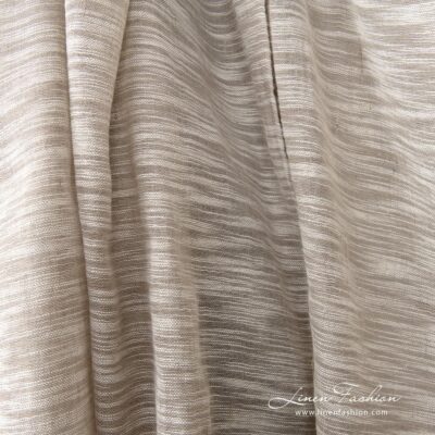 Linen cotton fabric sand colour with white stripes close up detail