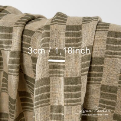 100% washed linen fabric in checks.