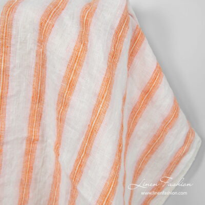 Washed linen fabric in orange stripes 5 Linen fabric in off white, orange and light pink stripes, washed