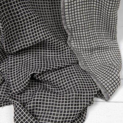 Half-linen fabric in black and white checks washed 7 Half-linen fabric in black and white checks washed texture