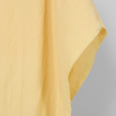 Washed linen cotton fabric light yellow, fabric edge