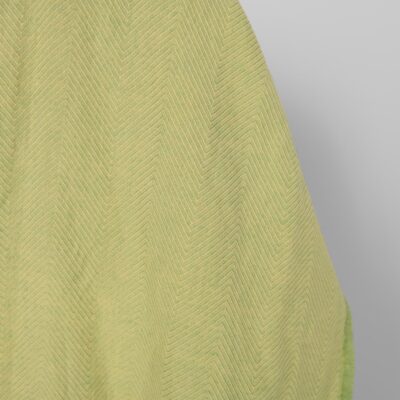 Washed linen cotton fabric yellow green herringbone, fabric edge