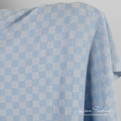 Bluish linen cotton fabric in checks, washed