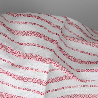 White linen-cotton fabric in red patterned stripes