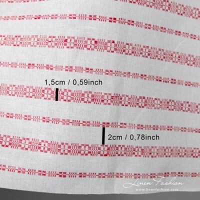 White linen-cotton fabric with horizontal red patterned stripes, woven in traditional folk geometric ornaments