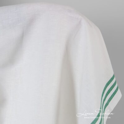 Optical white linen cotton fabric in green stripes
