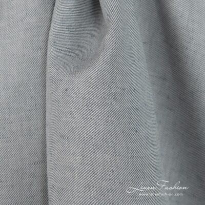 Linen cotton fabric blueish grey twill weave close up detail