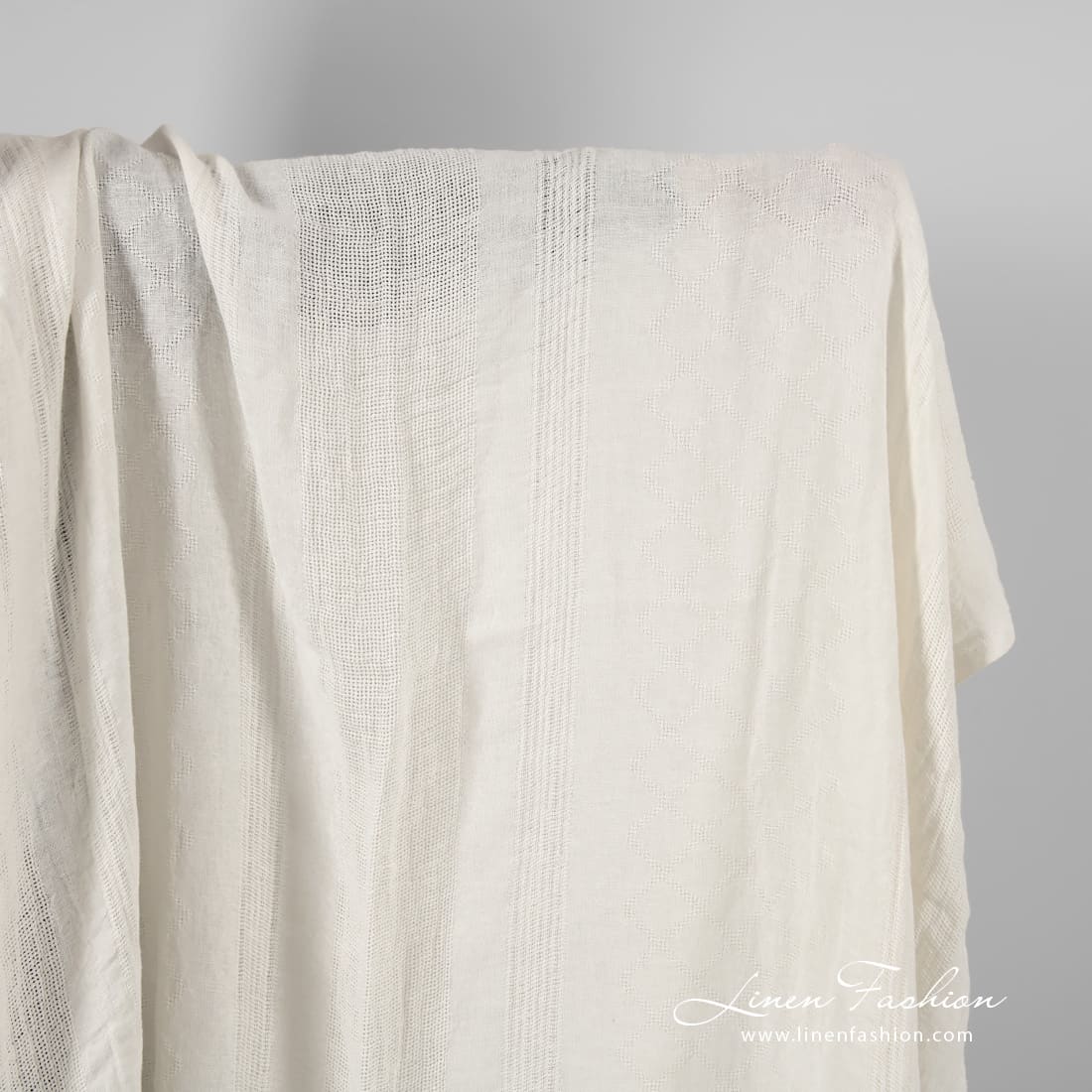 White linen fabric in rare stripes