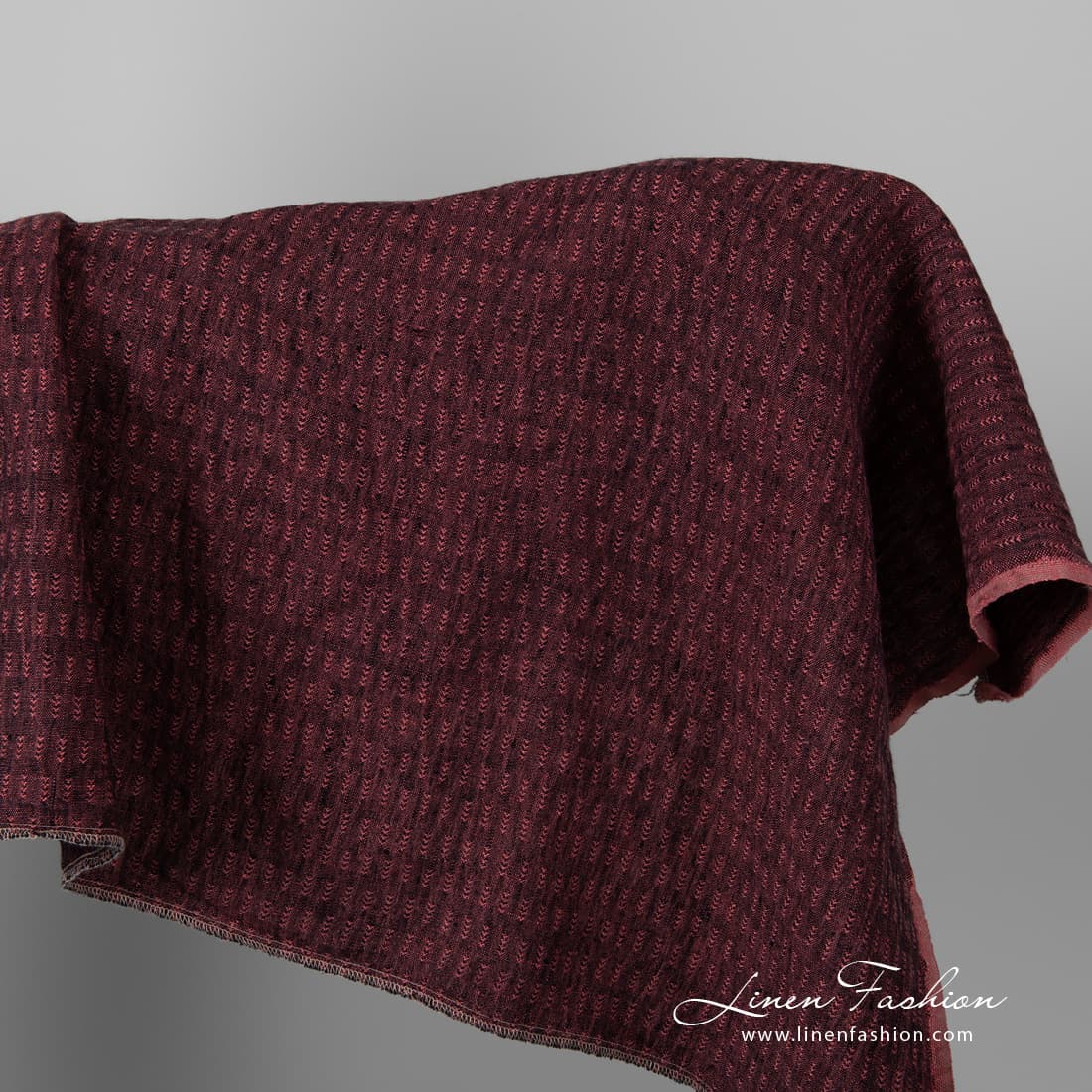 Black and rose colour patterned linen fabric.