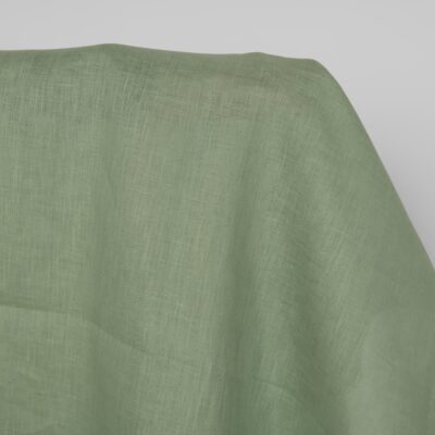 Linen fabric in muted light green, 100% linen