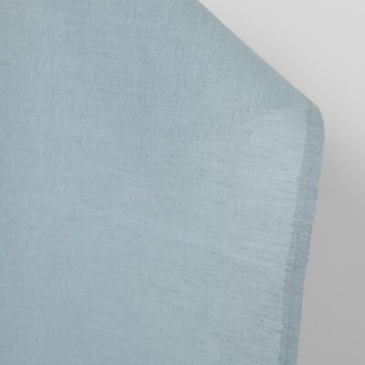 Linen fabric light greyish blue, fabric edge