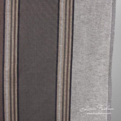 Close view of striped brown grey colored linen fabric