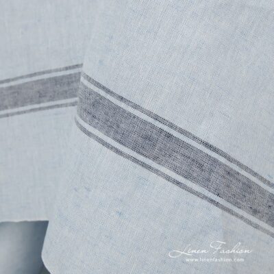 Light blue fabric in stripes.