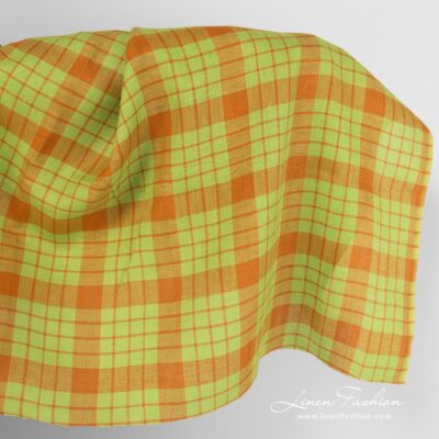 Linen fabric in green and orange checks.