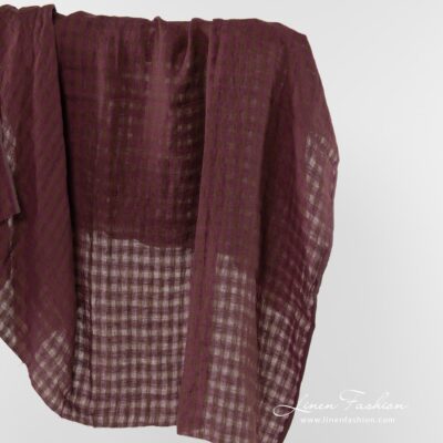 Linen fabric in brown and purple checks washed 5 Linen fabric in brown and purple checks.