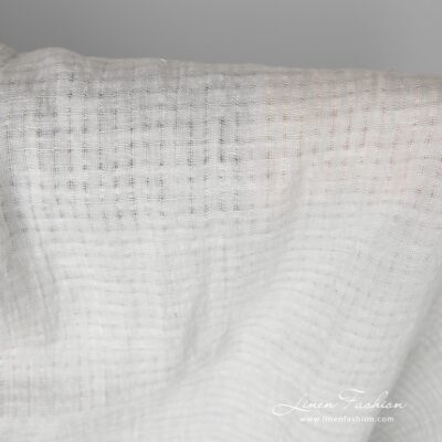Light grey openwork linen fabric washed 7 Light grey linen fabric with openwork stripes, which forms 1cm x 1cm (0.39”x0.39”) size checks