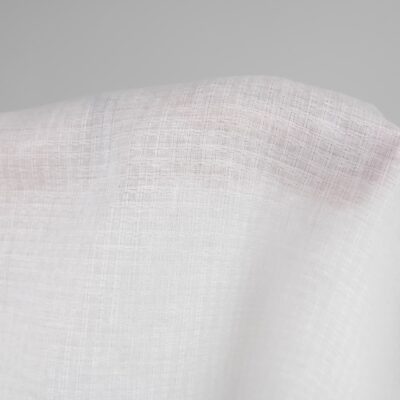 Linen fabric off-white colour patterned checks close up detail