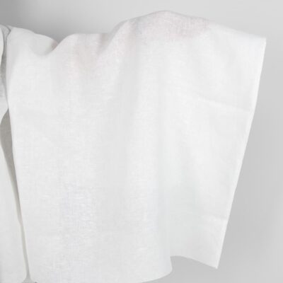 Off-white linen fabric in an openwork pattern