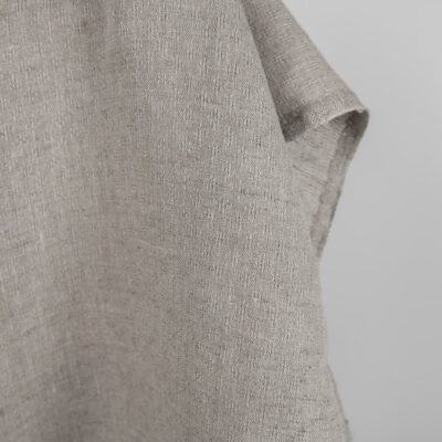 Natural linen fabric in an openwork pattern edge