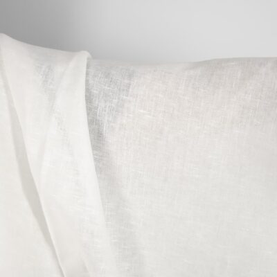 Pure linen fabric in off-white close up detail