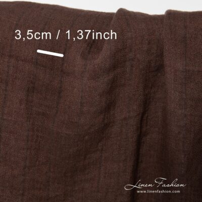 Washed linen fabric brown with vertical stripes 8 100% linen fabric in brown colour, washed.