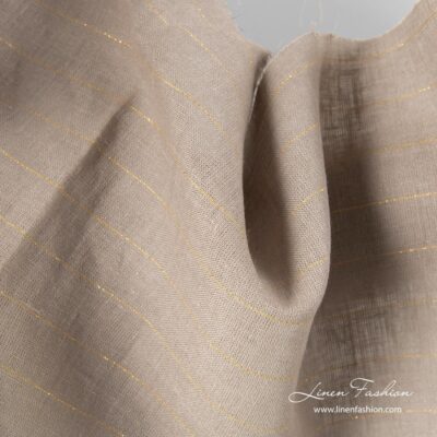 Gray linen fabric with golden stripes