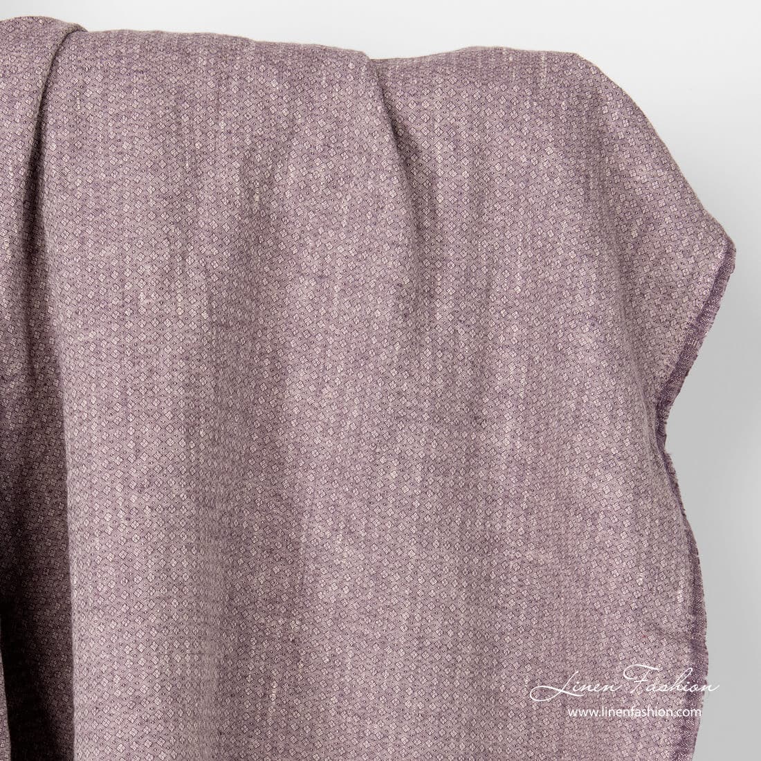 Washed purple linen fabric in small diamond pattern