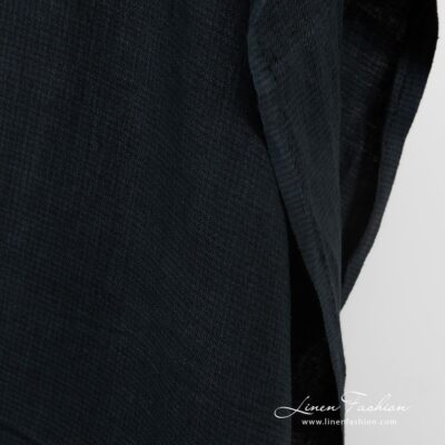 Dark blue linen fabric in twill weave and barely visible checks, specially washed