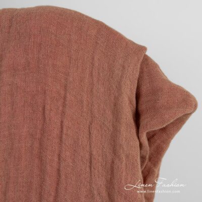 Double-sided linen fabric in brown and pink colours washed 8 Double-sided linen fabric in brown and pink colors, perfect for clothes and home textile