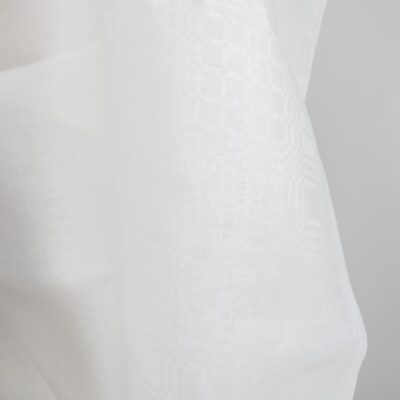Checked off-white linen fabric close up detail