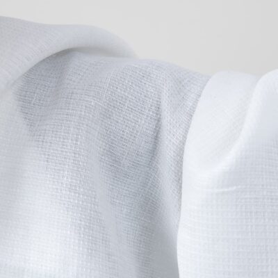 Bright white linen fabric in a small check pattern texture