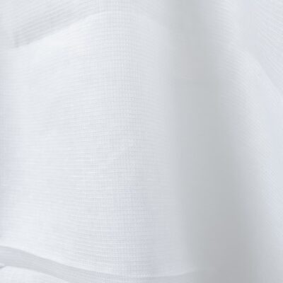 Bright white linen fabric in a small check pattern close up detail