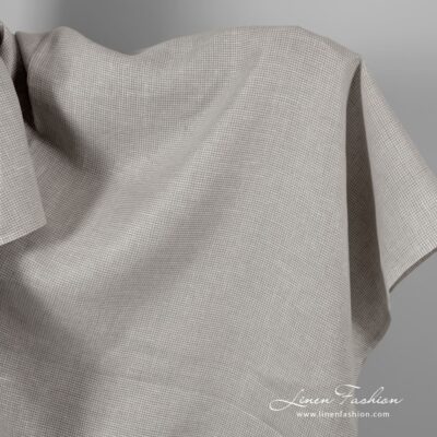 Off-white and natural linen fabric in houndstooth pattern