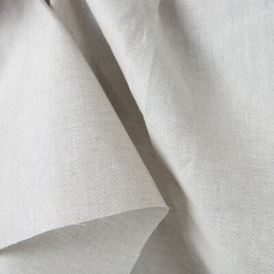 Linen fabric beige in herringbone pattern 9 Linen fabric beige in herringbone pattern close up detail