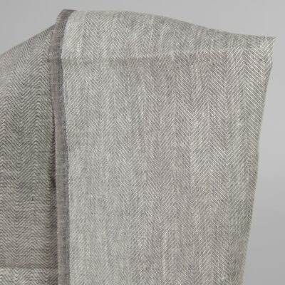 Linen fabric greyish brown in herringbone pattern back side