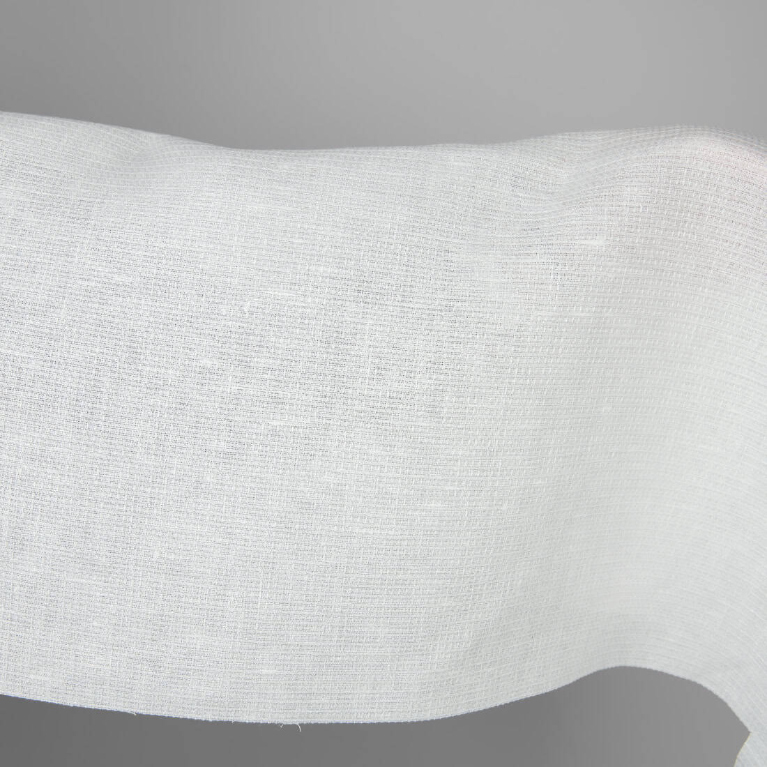 Off-white linen fabric in a small check pattern