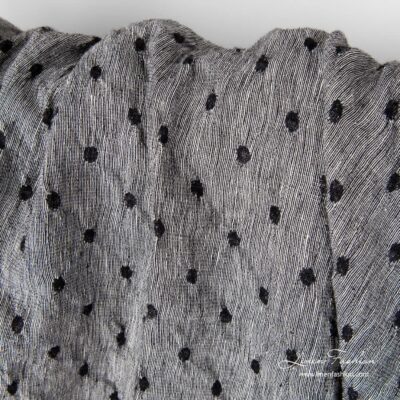 Black/white linen wool fabric with dots washed 5 Washed black white linen wool fabric.