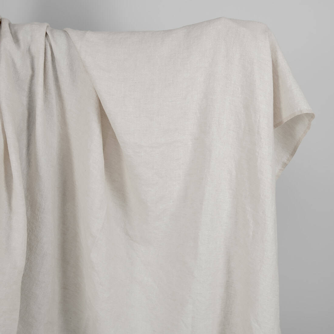Washed linen wool fabric beige in herringbone pattern