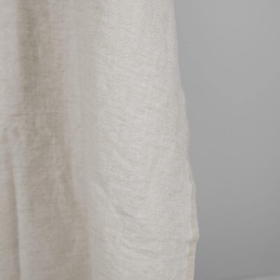Washed linen wool fabric beige in herringbone pattern edge