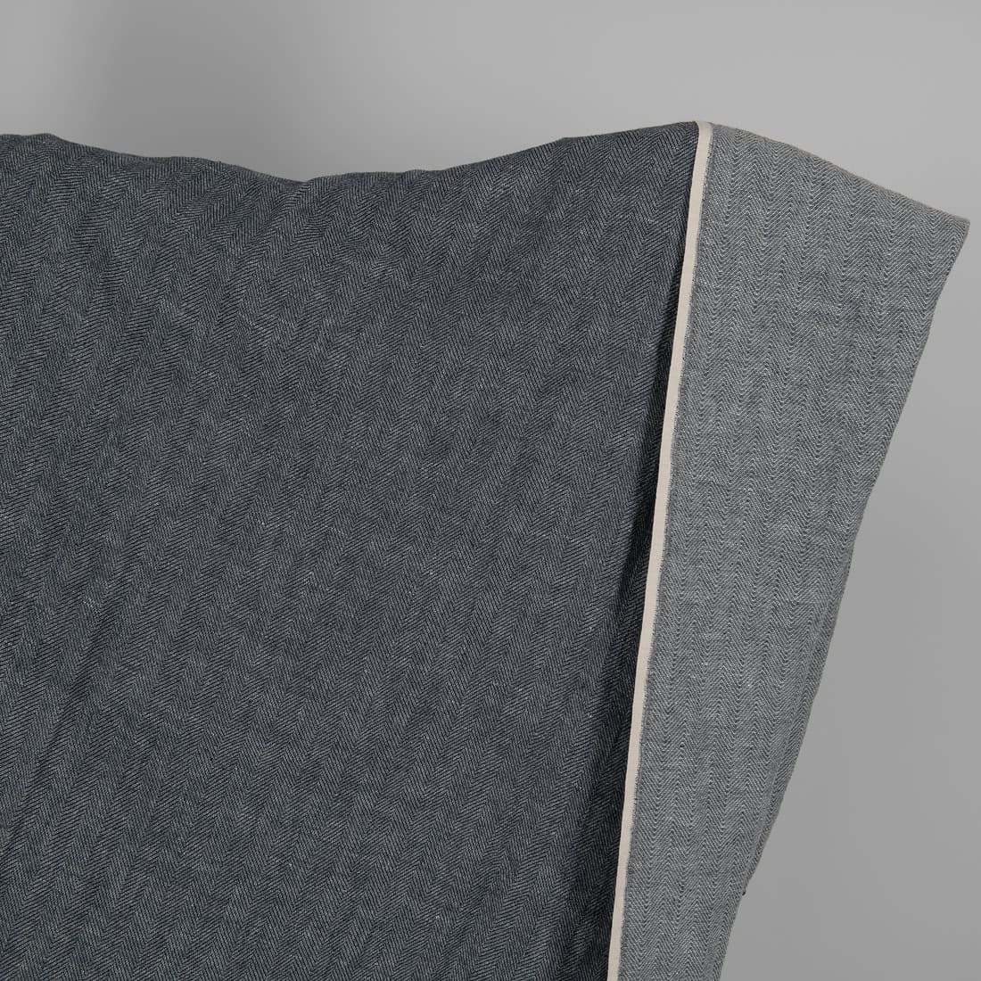 Washed linen wool fabric black white in herringbone pattern