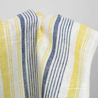 Narrow white linen fabric with blue and yellow stripes