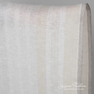 Narrow linen fabric in off-white colour and openwork stripes 5 Off white fabric with stripes.