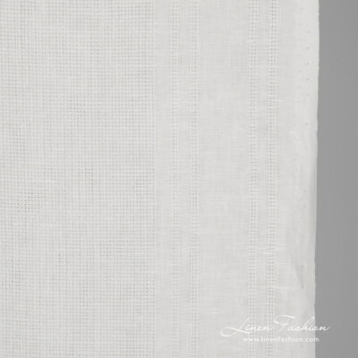 Narrow linen fabric white patterned close up detail