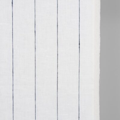 Narrow linen fabric white with thin blue stripes close up detail