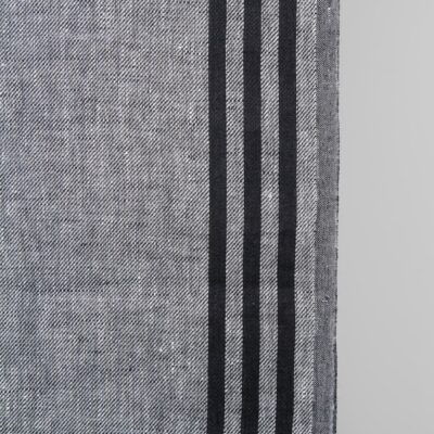 Narrow linen fabric grey with black stripes on sides close up detail