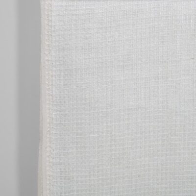 Narrow linen fabric off-white waffle close up detail
