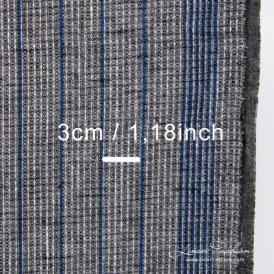 Black linen fabric with blue stripes.