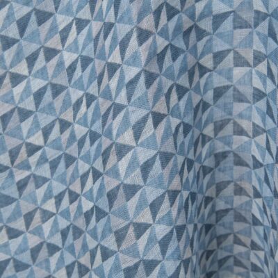 Washed linen fabric in blue triangles 7 Washed linen fabric in blue triangles close up detail