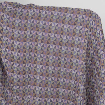 Washed linen fabric in violet multicolour triangles