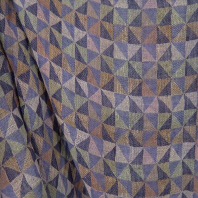 Washed linen fabric in violet multicolour triangles close up detail